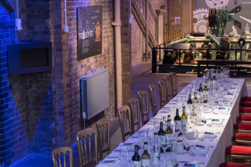 Dine surrounded by the old engines that used to lift the bridge.